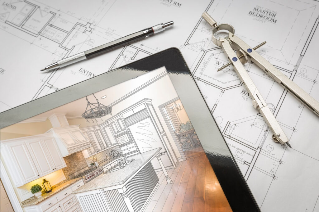 Computer Tablet Showing Kitchen Illustration Sitting On House Plans With Pencil And Compass.